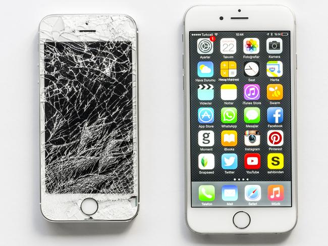 Antalya, Turkey - April 22, 2015: Apple iPhone 6, the newest version of this revolutionary mobile device displaying the home page and iPhone 5s with broken screen