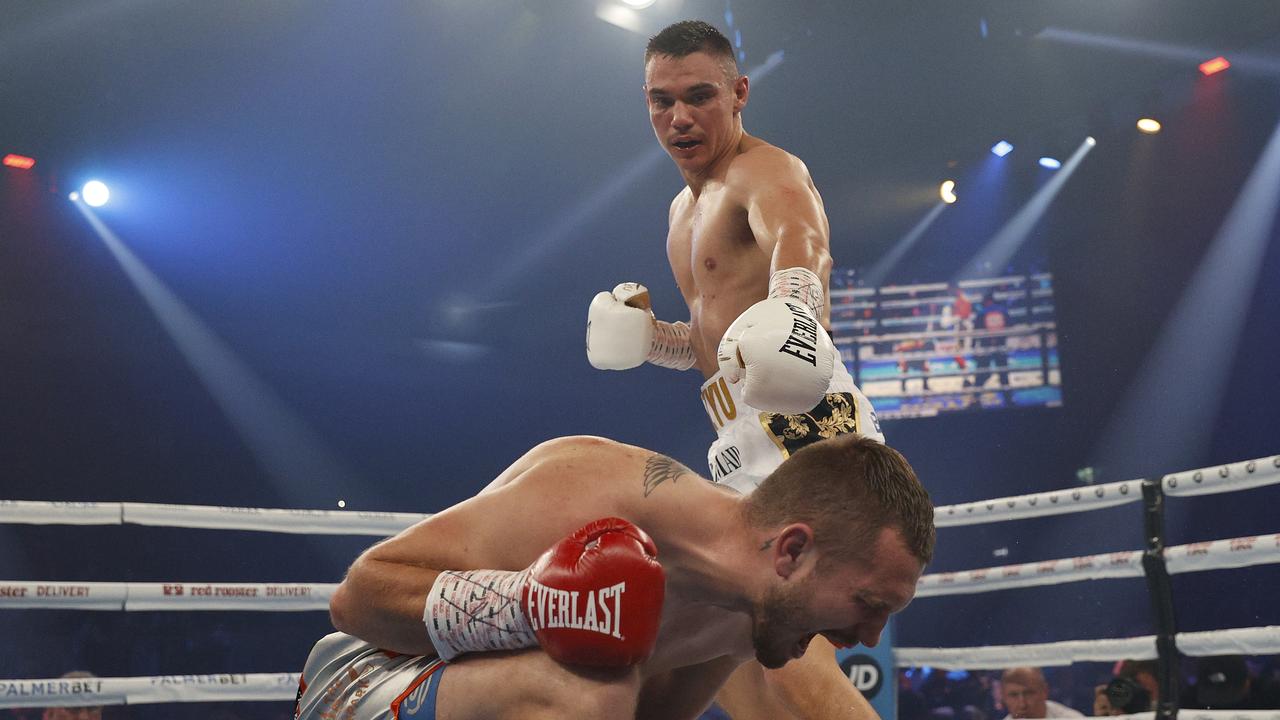 NEWCASTLE, AUSTRALIA - JULY 07: Tim Tszyu knocks out Stevie Spark during the WBA Oceania WBO Global super welterweight title fight between Tim Tszyu and Stevie Spark at Newcastle Entertainment Centre on July 07, 2021 in Newcastle, Australia. (Photo by Mark Evans/Getty Images)