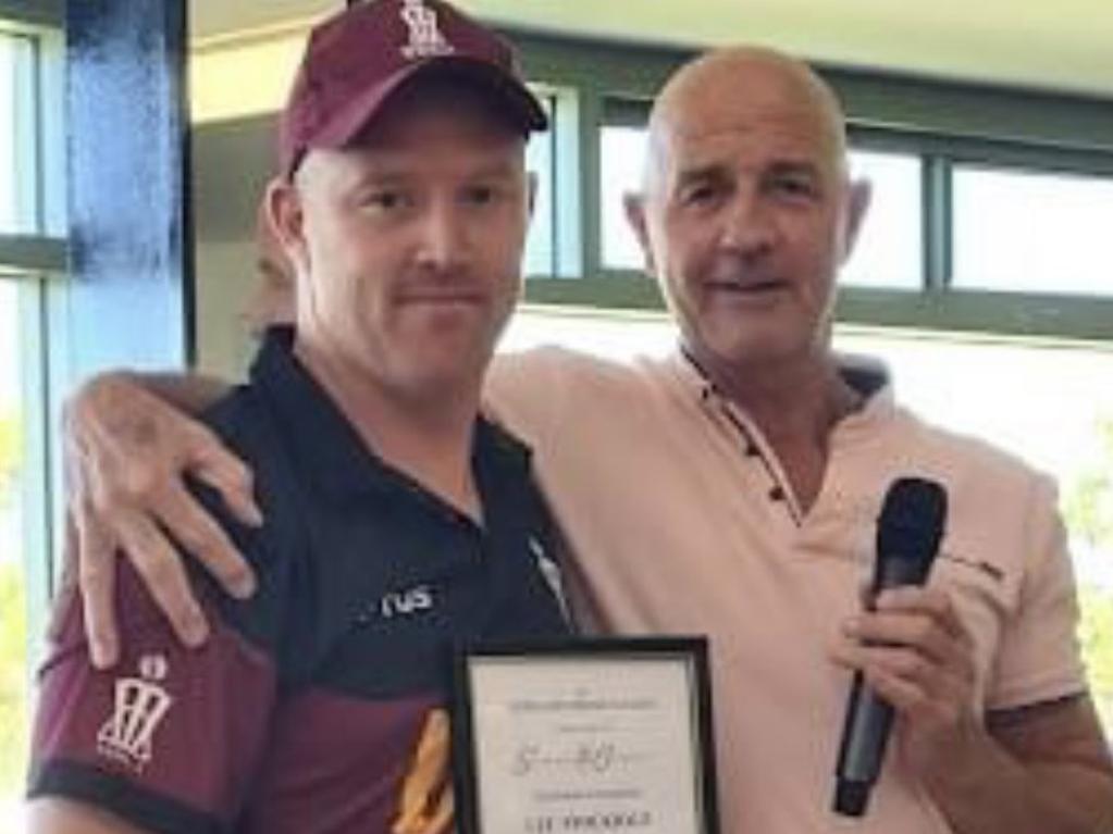 Former first-class paceman Mark Ridgway presents Lee Stockdale with his legend status plaque last year.