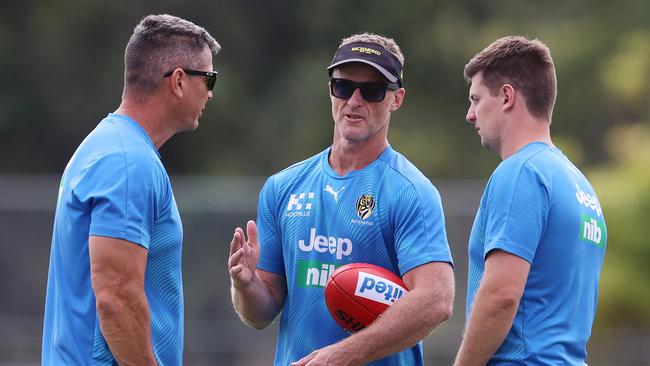 Former Tigers coach Damien Hardwick with then assistants, current Giants coach Adam Kingsley and Andrew McQualter in 2020. Picture: Michael Klein