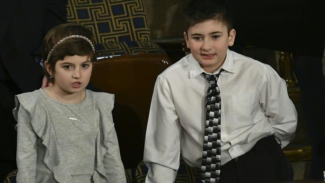 Special guests include Eline (L) and Joshua Trump. Picture: AFP.