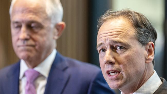 Minister for Health Greg Hunt speaks to the media alongside Prime Minister Malcolm Turnbull following a tour of the Peter McCallum Cancer Centre in Melbourne, Monday, July 16, 2018. (AAP Image/Daniel Pockett) NO ARCHIVING