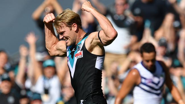 Jack Watts celebrates a goal.