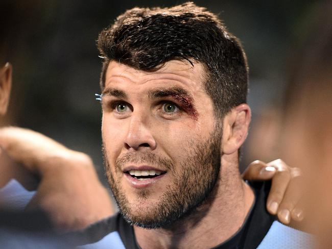 Michael Ennis of the Sharks speaks to his team following their win over the Raiders in the NRL Qualifying Final between the Canberra Raiders and the Cronulla Sutherland Sharks at GIO Stadium in Canberra, Saturday, Sept. 10, 2016. (AAP Image/Dan Himbrechts) NO ARCHIVING, EDITORIAL USE ONLY