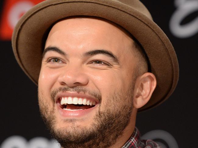 VIENNA, AUSTRIA - MAY 17: Guy Sebastian of Australia gestures with his singers during a meet and greet with the press ahead of the Eurovision Song Contest 2015 on May 17, 2015 in Vienna, Austria. (Photo by Nigel Treblin/Getty Images)