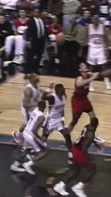 Mutombo blocks three straight shots then wags finger