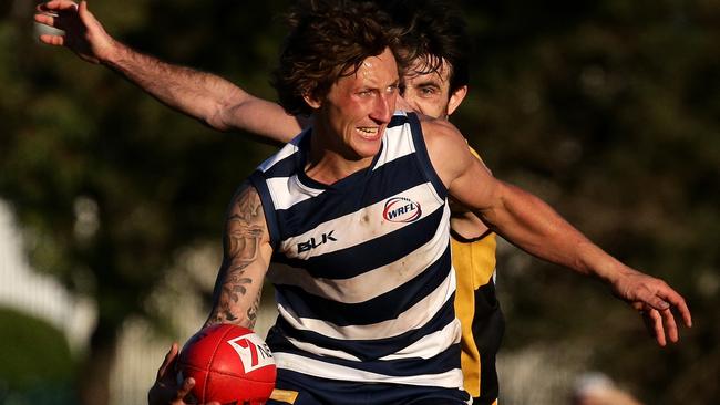 Todd Finco of Albion gathers the ball during the WRFL Football match between Albion and Werribee Districts played in Sunshine on Saturday 2nd May, 2015. Picture: Mark Dadswell