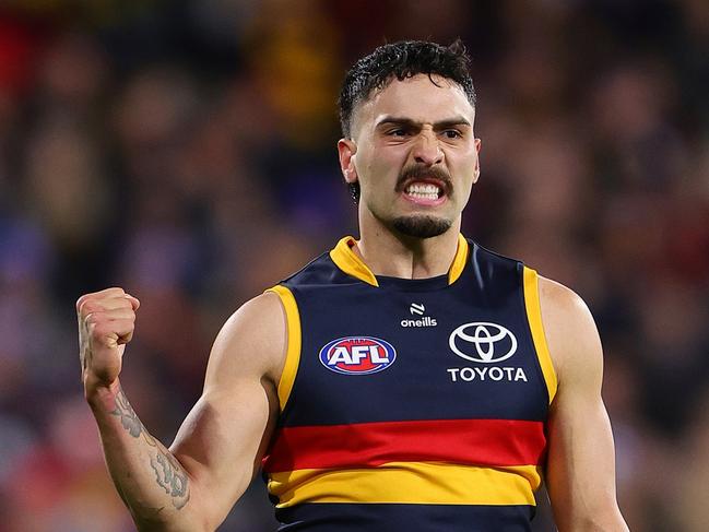 ADELAIDE, AUSTRALIA - JUNE 15: Izak Rankine of the Crows celebrates a goal during the 2024 AFL Round 14 match between the Adelaide Crows and the Sydney Swans at Adelaide Oval on June 15, 2024 in Adelaide, Australia. (Photo by Sarah Reed/AFL Photos via Getty Images)