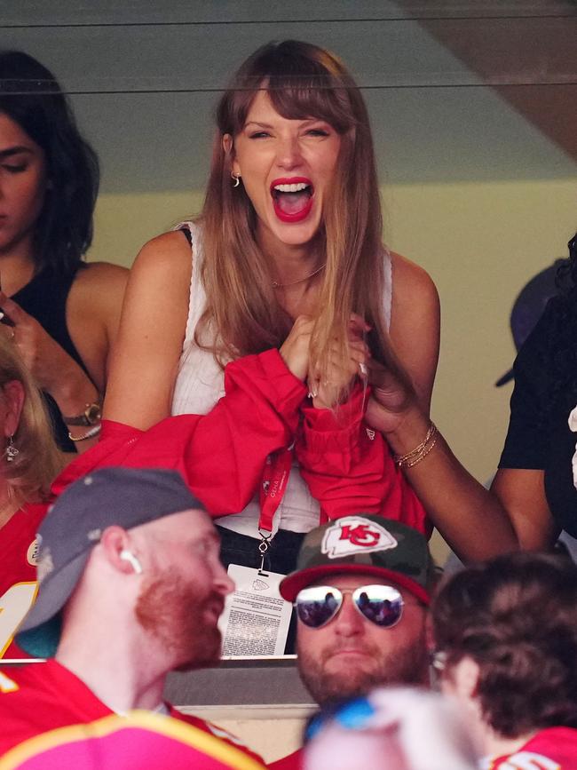 Taylor and Travis’ love story began as she watched her new man on the field in Kansas City yesterday. Picture:  Jason Hanna/Getty Images