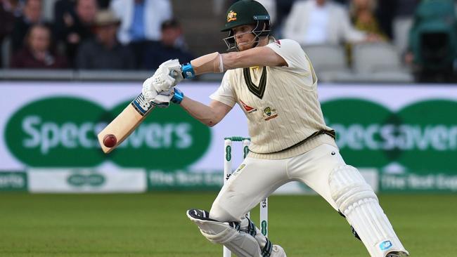 Steve Smith plays a shot to the offside during his innings of 82 in the second innings of the fourth Ashes Test at Old Trafford Picture: AFP