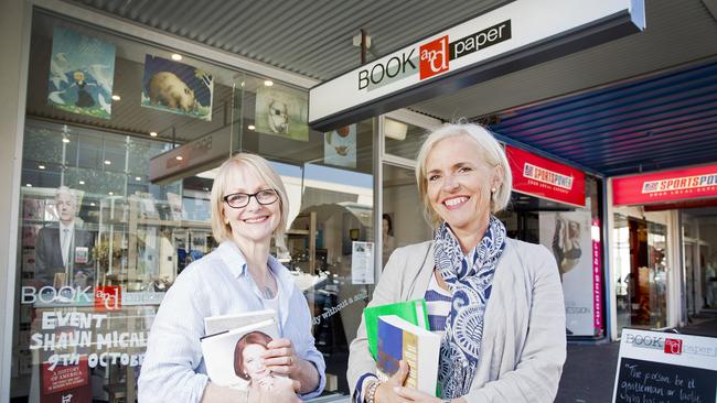 Book and Paper book shop owners Sue Martin and Wenche Osland at their Williamstown store. Picture: Nathan Dyer