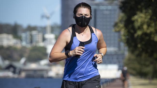 Confusion around wearing masks while exercising has been clarified as police report the Territory public as a whole have been following Covid-19 rules. Picture: Matt Jelonek/Getty Images