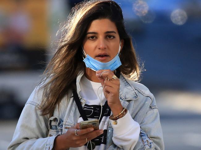 SYDNEY, AUSTRALIA - NewsWire Photos AUGUST 06, 2021 - A woman with a mask in Sydney.Picture: NCA NewsWire / Christian Gilles