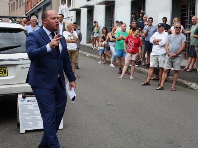 SUNDAY TELEGRAPH. FEBRUARY 17, 2024.Pictured is Auctioneer Ricky Briggs during an auction at 4 Water St, Annandale today. Picture: Tim hunter.