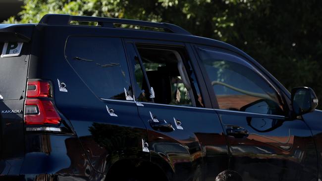 The bullet-riddled 4WD is taken away as evidence from the Fairfield crime scene. Picture by Damian Shaw