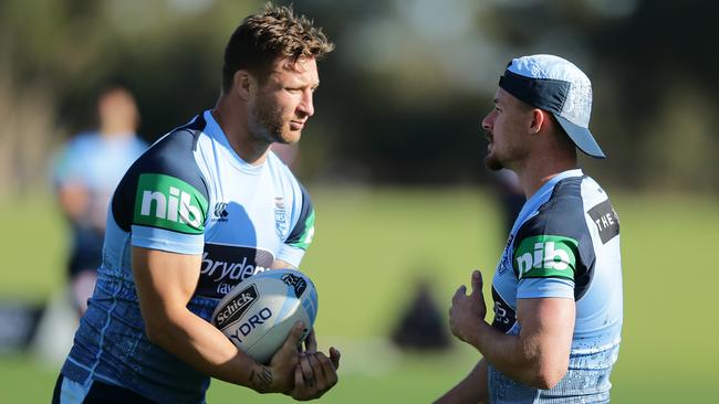 Tariq Sims with Damien Cook at Blues training.