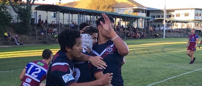 Ipswich SHS celebrate a try to winger Montell Newman in the Langer Cup.