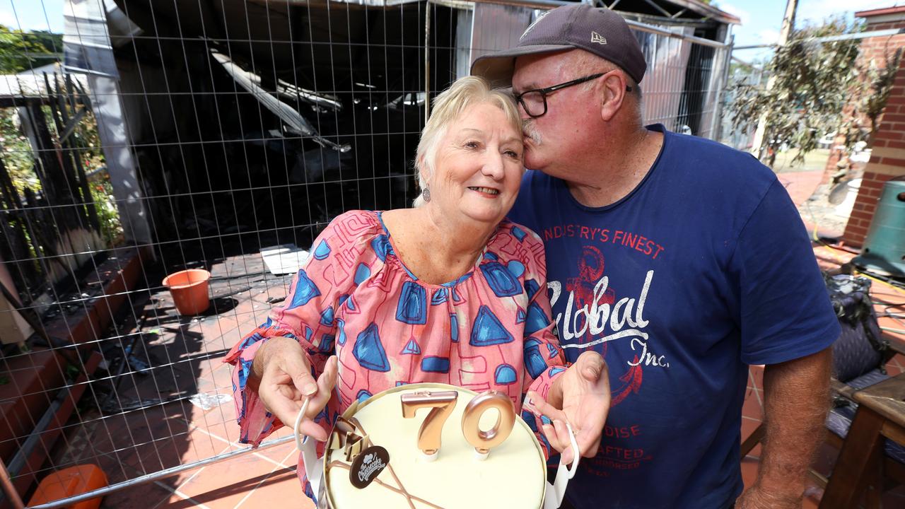 Gail and Andy McDonald in front of their burnt out garage at their Drysdale home. Picture: Mike Dugdale