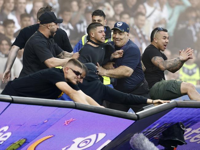 *APAC Sports Pictures of the Week - 2022, December 19* - MELBOURNE, AUSTRALIA - DECEMBER 17: Fans storm the pitch in protest during the round eight A-League Men's match between Melbourne City and Melbourne Victory at AAMI Park, on December 17, 2022, in Melbourne, Australia. (Photo by Darrian Traynor/Getty Images)