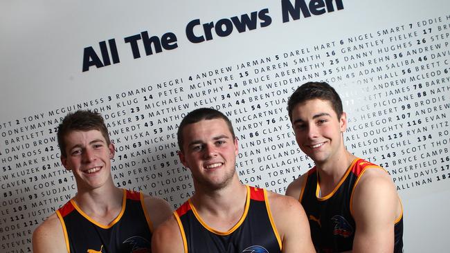 Adelaide’s 2012 recruits Sam Siggins and Rory Atkins with Brad Crouch (centre) who was able to play on the senior list in 2012.