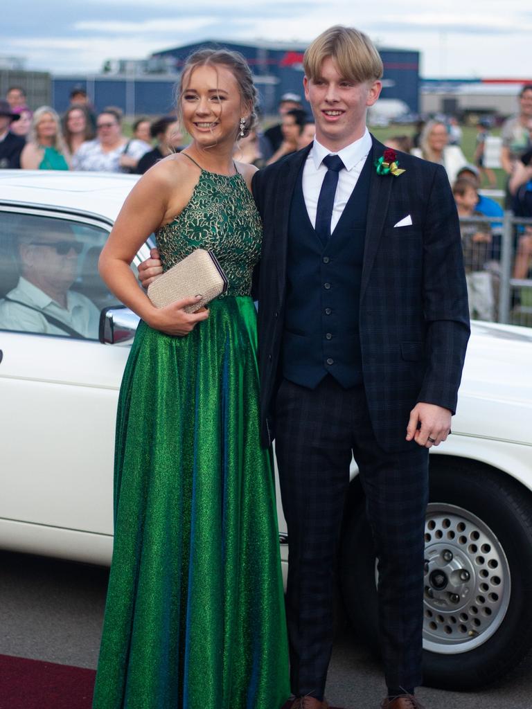 Scott Black and Keely Dunn arrived in a 1985 Jaguar Sovereign Series III.