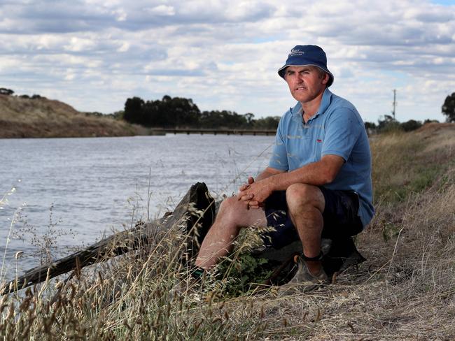 Australia system of water trading doesn’t always keep everyone happy though. Dairy Farmer Tony McCarthy next to an irrigation channel on his property at Dhurringle in Victoria. He has concerns about losing water from the system to be allocated further down stream in South Australia. Picture: David Geraghty, The Australian.