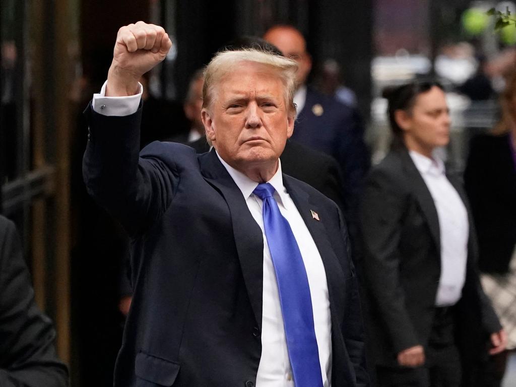 Donald Trump raised a fist as he arrived back at Trump Tower after being convicted in his criminal trial in New York City, in May. Picture: AFP