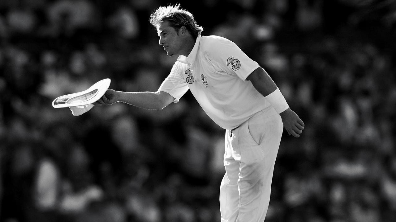 Shane Warne of Australia bows to the crowd