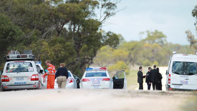 Police and SES at Elwomple Rd, near Tailem Bend, where a man was fatally shot. Picture: Dylan Coker