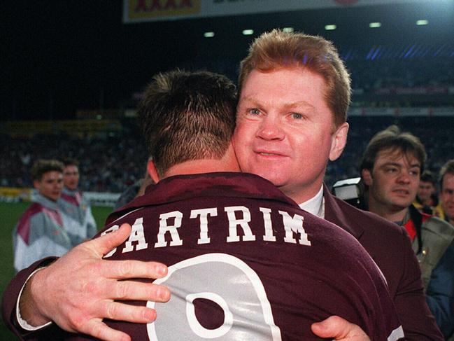 Vautin embracing Wayne Bartrim.