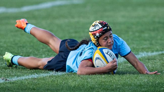 NSW Waiaria Ellis scoring one of her many tries at the Australian schools rugby championships. Picture: Julian Andrews