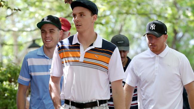 Crows players Paul Seedsman, Jake Lever and Kyle Cheney arrive for their end of season lunch.