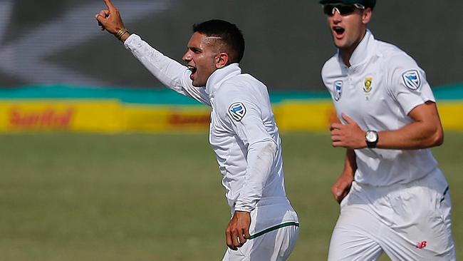 Keshav Maharaj celebrates the dismissal of Shaun Marsh. Picture: AFP.