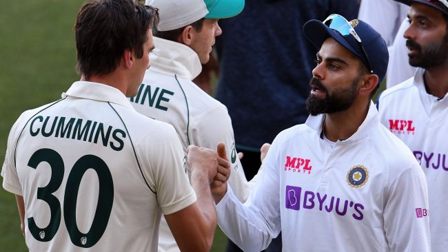 Pat Cummins shakes hands with Virat Kohli after the match. Picture: Getty Images