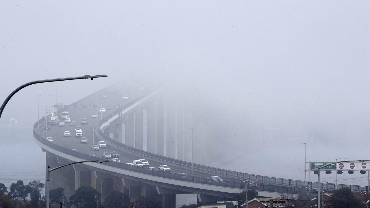 Fog over Tasman Bridge. Picture: Chris Kidd