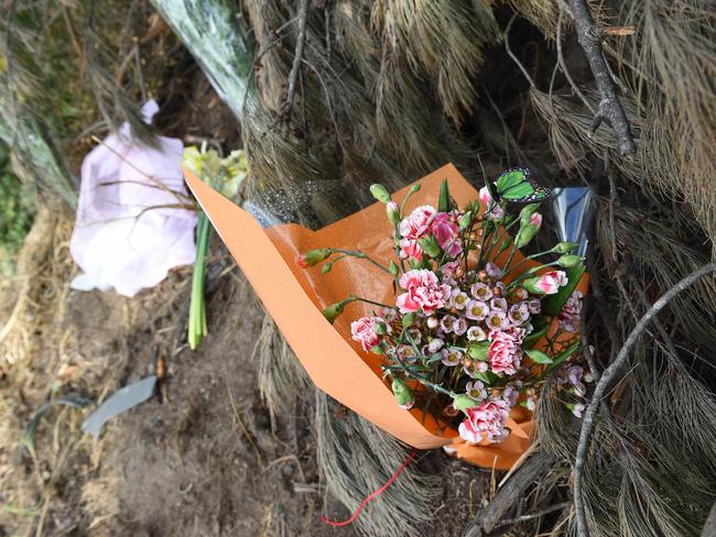 Flowers near the site of the crash where a 14-year-old and her mother lost their lives Picture: Chris Eastman