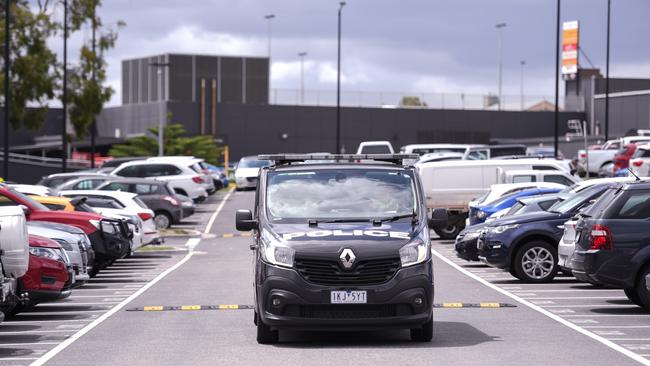 Police patrol a shopping centre carpark, which are hot spots for vehicle crime. Picture: Penny Stephens