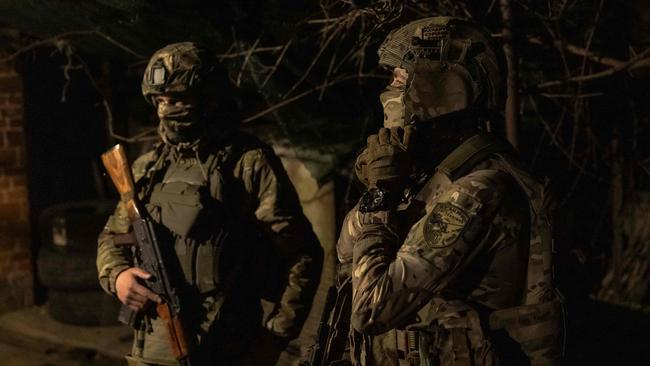 Ukrainian soldiers from the 5th Assault Brigade gather before heading for a 4-day rotation to the frontline. Picture: AFP