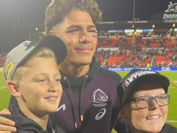 Broncos superstar Reece Walsh with young fans at Panthers Stadium.