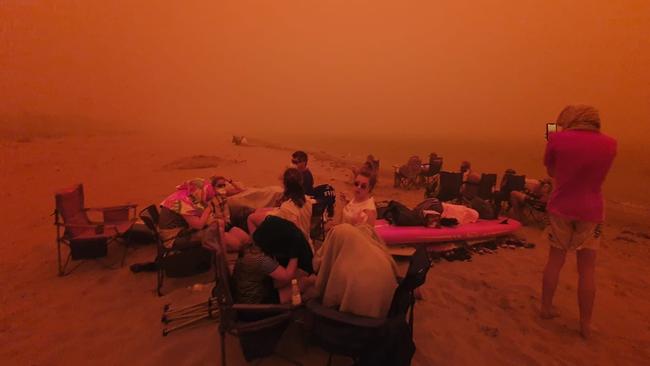 Much of NSW was devastated by the bushfires of 2019/2020. Pictured is the evacuation effort down at Batemans Bay. Picture NSW Surf Lifesaving