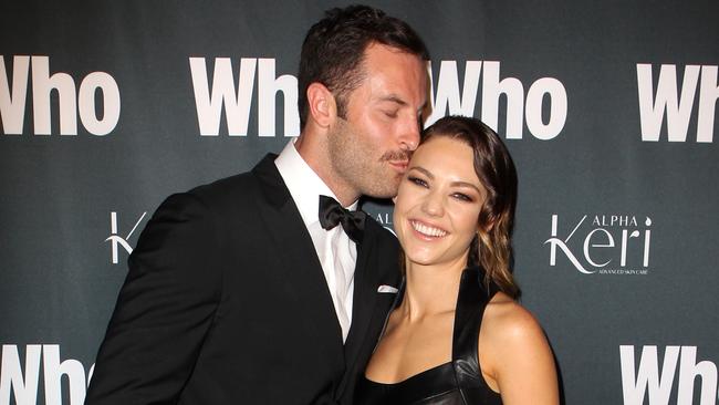 Sasha Mielczarek and Sam Frost at the Who's Most Intriguing Official Party.