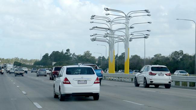 The new M1 signs at Yatala have caused traffic gridlock. Picture Mike Batterham