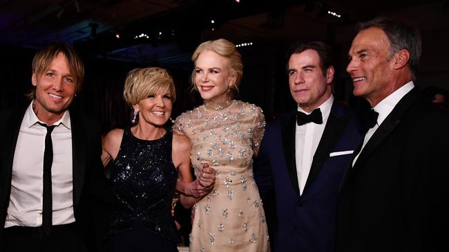 John Travolta cosies up with Aussies Nicole Kidman, Keith Urban, Julie Bishop and David Panton.