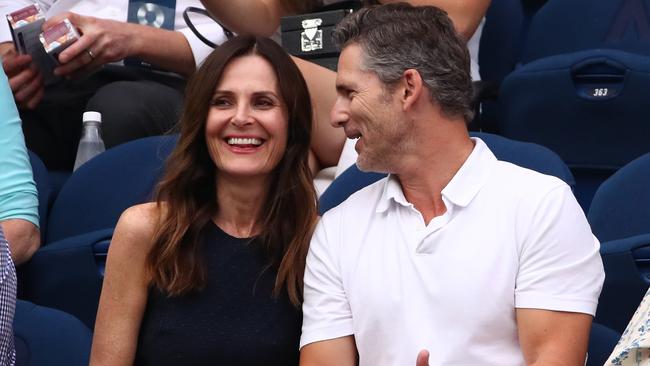 Eric Bana and Rebecca Gleeson watch the men's semi final. Picture: Getty Images 