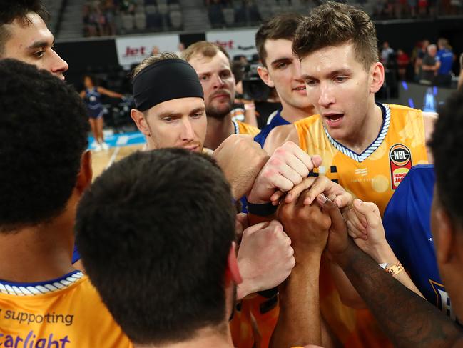 Will Magnay celebrates the Bullets’ win at Melbourne Arena.