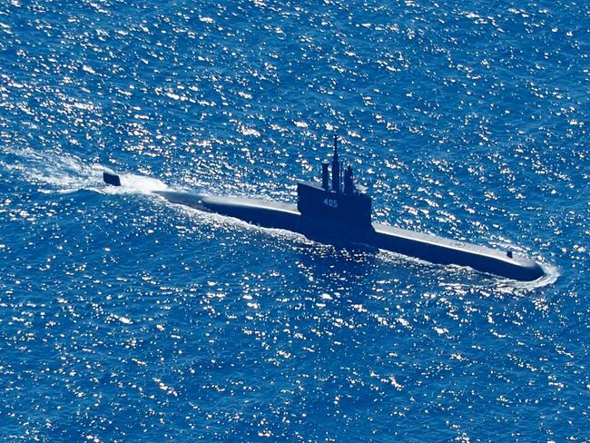 An aerial photo taken from a maritime patrol aircraft of 800 Air Squadron of the 2nd Air Wing of Naval Aviation Center (PUSPENERBAL), shows Indonesian Navy submarine KRI Alugoro sailing on a search mission for KRI Nanggala, a Navy submarine that went missing during a naval exercise, in the waters off Bali Island, Indonesia, 22 April 2021. The German-made submarine was reported missing on 21 April 2021 near the island of Bali with 53 people on board while preparing to conduct a torpedo drill, the the Indonesian National Armed Forces said. EPA/ERIC IRENG