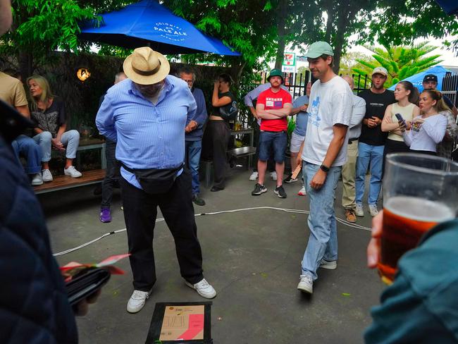 Onlookers can generally only bet on heads or tails, however some venues allow bets on odds. Picture: NewsWire / Luis Enrique Ascui