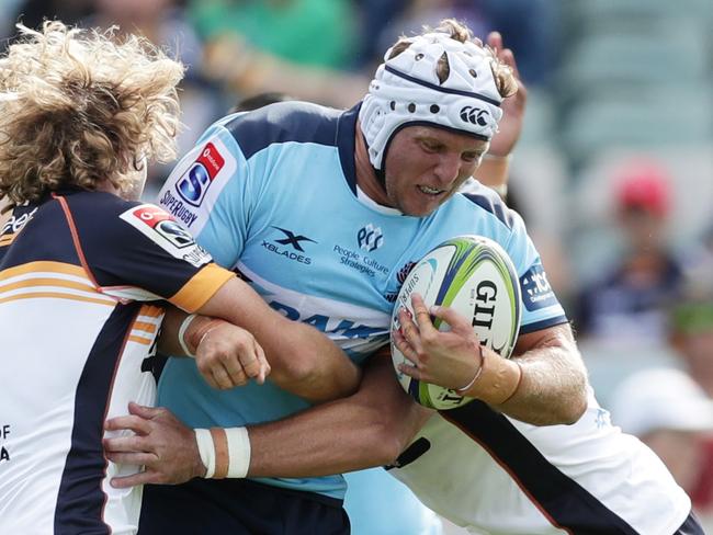 CANBERRA, AUSTRALIA - MARCH 15: Damien Fitzpatrick of the Waratahs is tackled during the round seven Super Rugby match between the Brumbies and the Waratahs at GIO Stadium on March 15, 2020 in Canberra, Australia. (Photo by Mark Metcalfe/Getty Images)