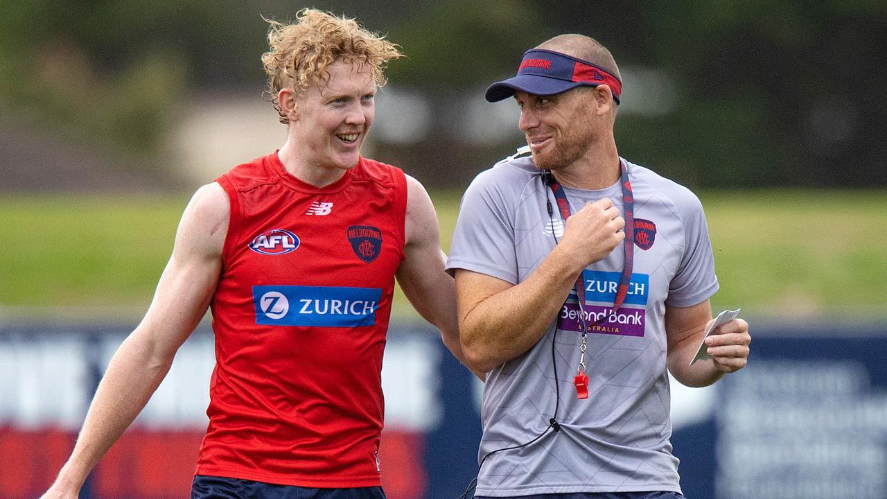 Simon Goodwin (right) with Clayton Oliver during Melbourne’s pre-season training. Picture: Mark Stewart