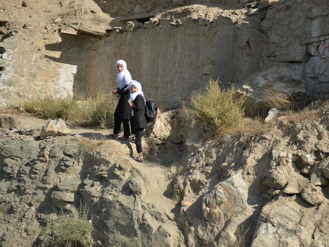 School girls walk home in Kabul on September 13, 2021. The UN has warned of a humanitarian crisis under Taliban rule. Picture: AFP